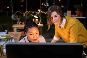 Women looking at computer in the office